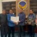 Sah! DPP NasDem Berikan SK untuk Paslon Haili Yoga dan Muchsin Hasan 