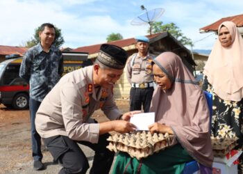 Jum’at Berkah! Polres Aceh Tengah Salurkan Bantuan Sembako di Kampung Mekar Maju 