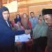 Bupati Haili Yoga Serahkan Bantuan Masa Panik untuk Korban Kebakaran di Timangan Gading